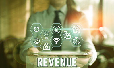 Handwriting text Revenue. Conceptual photo total amount of income generated by the sale of goods or...
