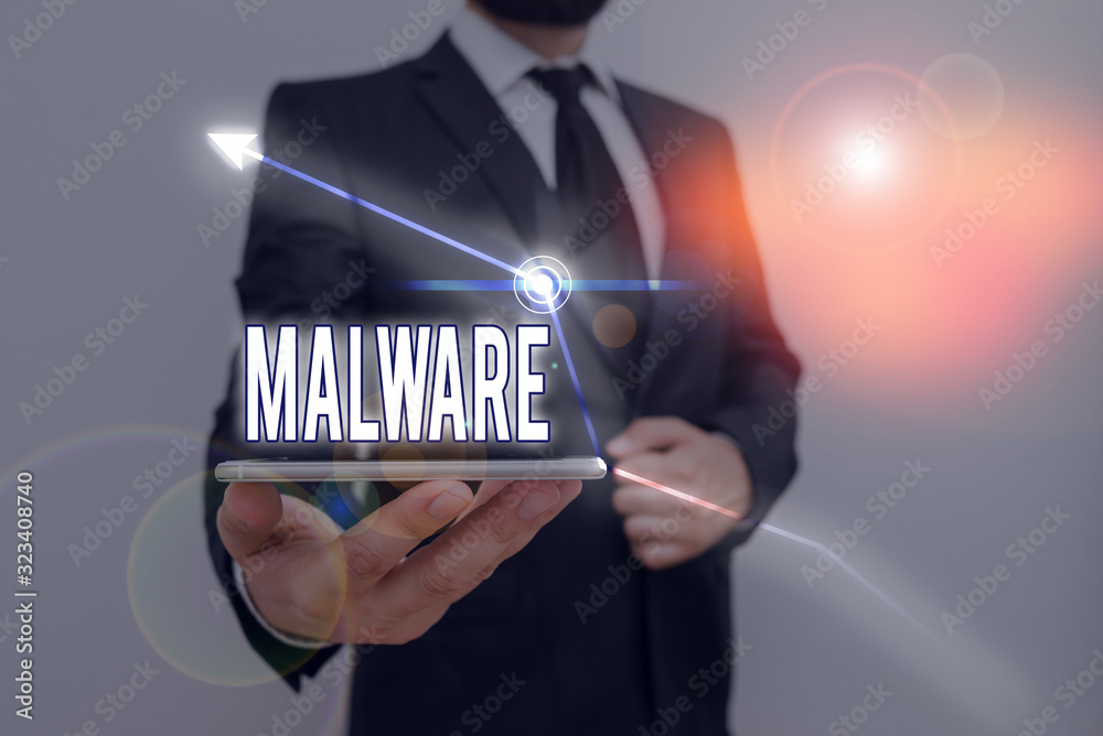 Poster handwriting text writing malware. conceptual photo malicious software or file that is harmful to a c