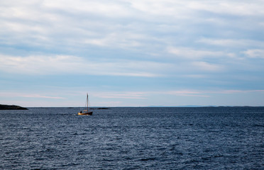 Koster island. A sailboat in the sea