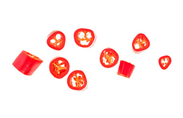 Red chopped chili peppers isolated on a white background, top view.
