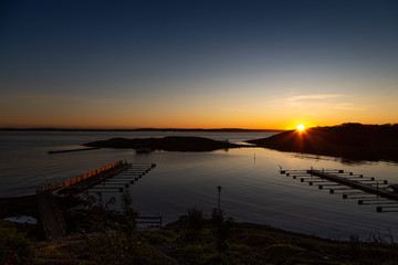 Sweden. Koster island. Sunset over harbor 