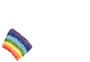 The rainbow of colorful crystals for diamond embroidery, mosaic on white background. Handmade hobby concept. Flat lay style with copy space for your text.