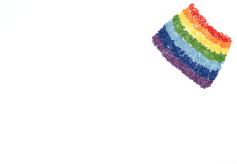 The rainbow of colorful crystals for diamond embroidery, mosaic on white background. Handmade hobby concept. Flat lay style with copy space for your text.