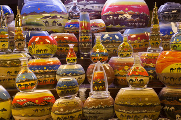 Traditional bottles decorated with colored sand in Dubai