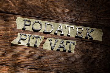 The deadline for the end of April is the settlement of the Polish PIT VAT CIT ZUS. Concept on an old wooden desk