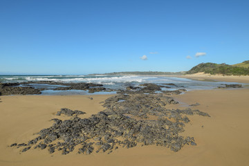 Rocks leading away to the Indian ocean in the Transkei South Africa
