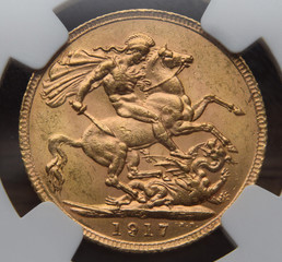 St George and the dragon on a gold sovereign macro