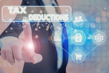 Handwriting text Tax Deductions. Conceptual photo amount or cost that can be subtracted from...