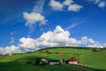 White clouds over agricultural area in Tynset, Norway