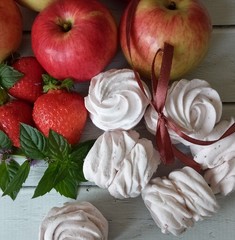  marshmallow with apple, strawberry and mint on burlap