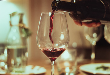 pouring red wine