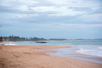 Fototapeta na wymiar Sunset in the beach of Tangalle, Sri Lanka.