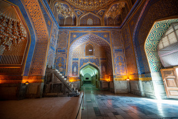 Fototapeta na wymiar The interior of the mosque in the Tilla-Kari Madrasah on the Registan square, Samarkand, Uzbekistan