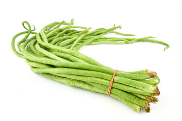 fresh Yard long beans or Chinese Long Beans (Vigna unguiculata subsp. sesquipedalis) isolated on a white background.Vegetables