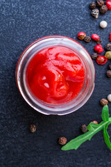 tomato sauce in a gravy boat on the table (sugo or ketchup) menu concept. background. top view. copy space