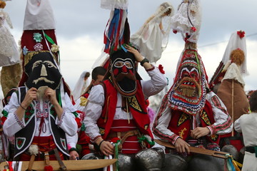 Elin Pelin, Bulgaria - February 15, 2020: Masquerade festival in Elin Pelin, Bulgaria. People with...