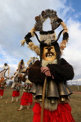 Elin Pelin, Bulgaria - February 15, 2020: Masquerade festival in Elin Pelin, Bulgaria. People with mask called Kukeri dance and perform to scare the evil spirits.