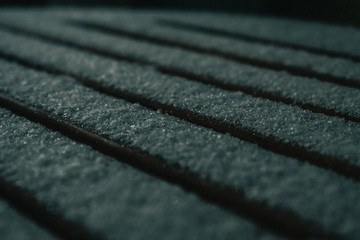 Fresh Snow Fall on a Spaced Wooden Table