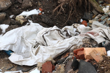 Construction waste with elements of various dismantled and destroyed old structures at municipal...