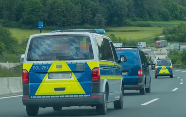 Police Cars driving on Motorway © pusteflower9024