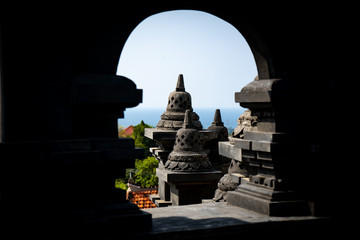 indonesian pagoda under an arch