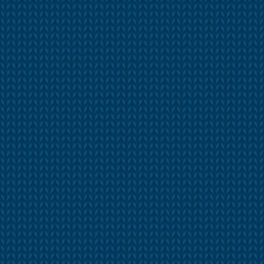 Seamless knitted dark blue pattern. Winter handycraft background