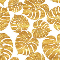 Seamless pattern of tropical gold monstera leaves on white background © Gribanessa