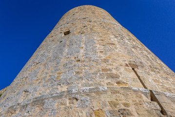 Fototapeta na wymiar Close up on a tower of castle in Salemi, small town in Trapani Province of Sicily Island in Italy