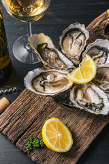 Fresh oysters with lemon ice and white wine.