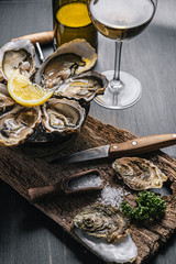 Fresh oysters with lemon ice and white wine.