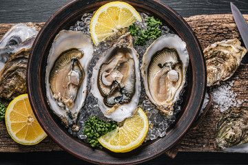 Fresh oysters with lemon ice and white wine.