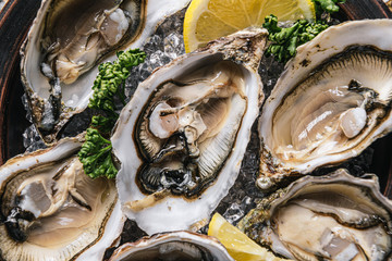 Fresh oysters with lemon ice and white wine.