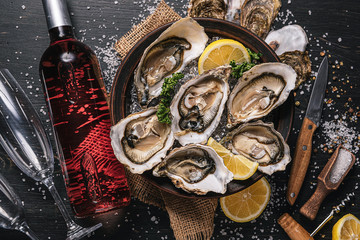 Fresh oysters with lemon ice and white wine.