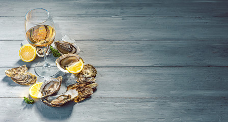 Fresh oysters with lemon ice and white wine.