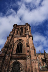Fototapeta na wymiar Cathedral of Our Lady (or Cathedrale Notre-Dame de Strasbourg, Cathedrale de Strasbourg, Strasbourg Minster) in Strasbourg, France. The Roman Catholic cathedral was built in 1176-1439 in Romanesque.