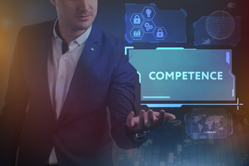Business, Technology, Internet and network concept. Young businessman working on a virtual screen of the future and sees the inscription: Competence