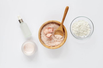 Organic natural cosmetics: salt, alginate mask, cream, top view