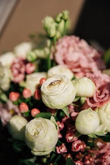 rings on the bride’s wedding bouquet