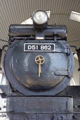 Fototapeta na wymiar レトロでアンティーク、かつて稼働した蒸気機関車のオブジェ