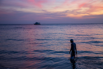 silhouette of a man at sunset