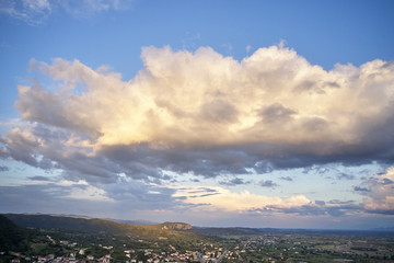 Legendary aerial drone view of ancient monasteries and breathtaking picturesque valley and landmark canyon of Meteora, Greece, Unesco