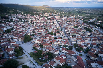 Legendary aerial drone view of ancient monasteries and breathtaking picturesque valley and landmark canyon of Meteora, Greece, Unesco