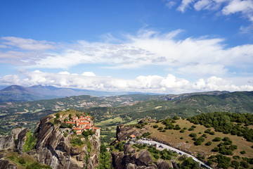 Legendary aerial drone view of ancient monasteries and breathtaking picturesque valley and landmark canyon of Meteora, Greece, Unesco