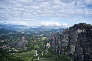 Fototapeta premium Legendary aerial drone view of ancient monasteries and breathtaking picturesque valley and landmark canyon of Meteora, Greece, Unesco