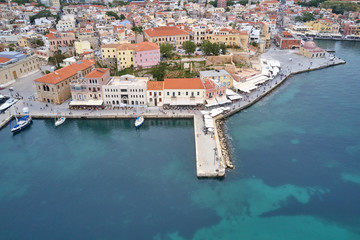 Panoramic drone aerial view from above of the city of Chania, Crete island, Greece. Landmarks of Greece, beautiful venetian town Chania in Crete island. Chania, Crete, Greece.