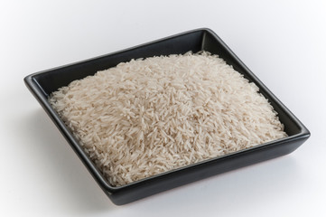 raw rice grains  in a plate