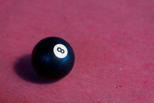 Pool Balls On Red Felt Table