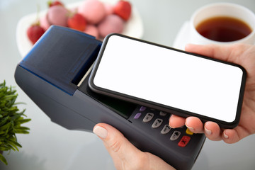 Woman payment purchase for phone and pay pass online terminal.