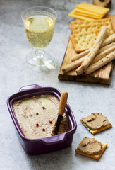 Chicken liver, onion and carrot paste, served with crackers, grissini and champagne.