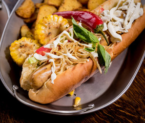 Hotdogs and French fries on a dishes. Fast food meal. Restaurant.